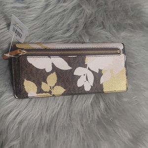 Brand new Michael Kors wallet.